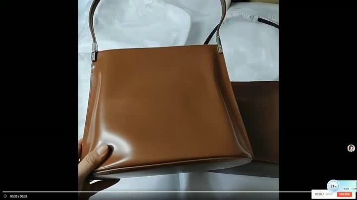 Brown glossy metal buckle shoulder bag
